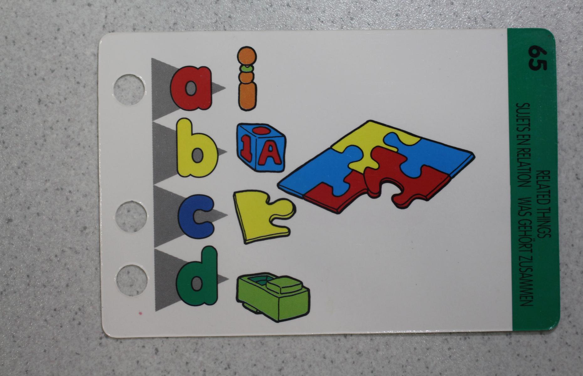 Einzelne Lernkarte des Lerncomputers &quot;Dickes Kind&quot;. Abgebildet sind die Wahlmöglichkeiten a bis d mit jeweils einer Abbildung daneben.